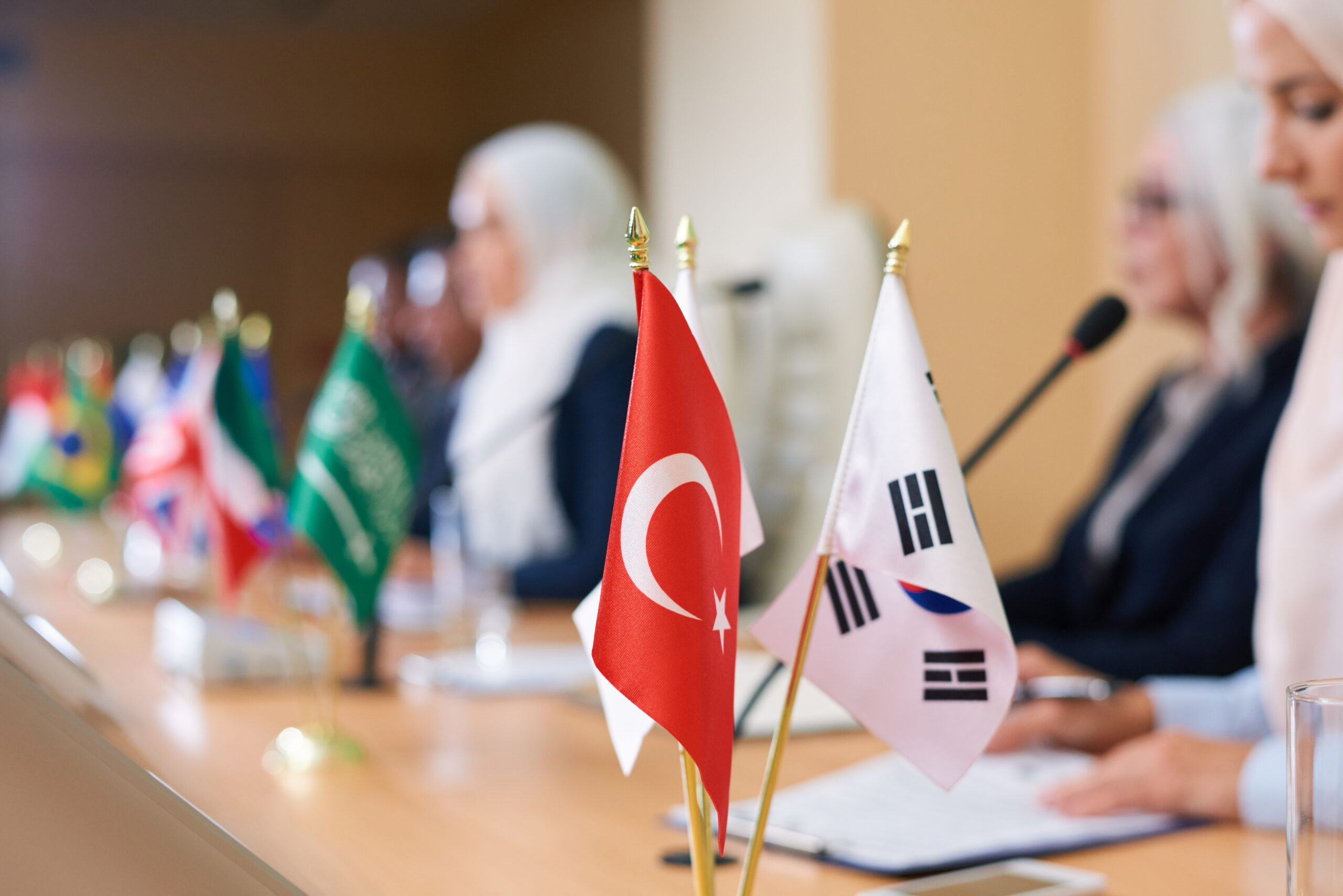 Turkish flag and two more of other foreign partner countries